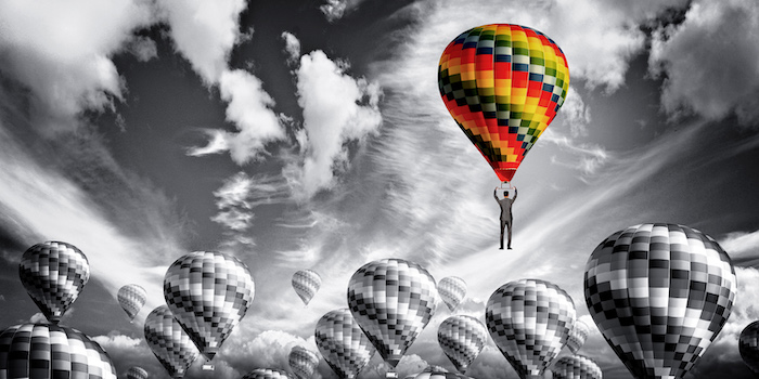 stockvault-businessman-leader-rising-in-a-hot-air-balloon-leadership-concept179148.jpg